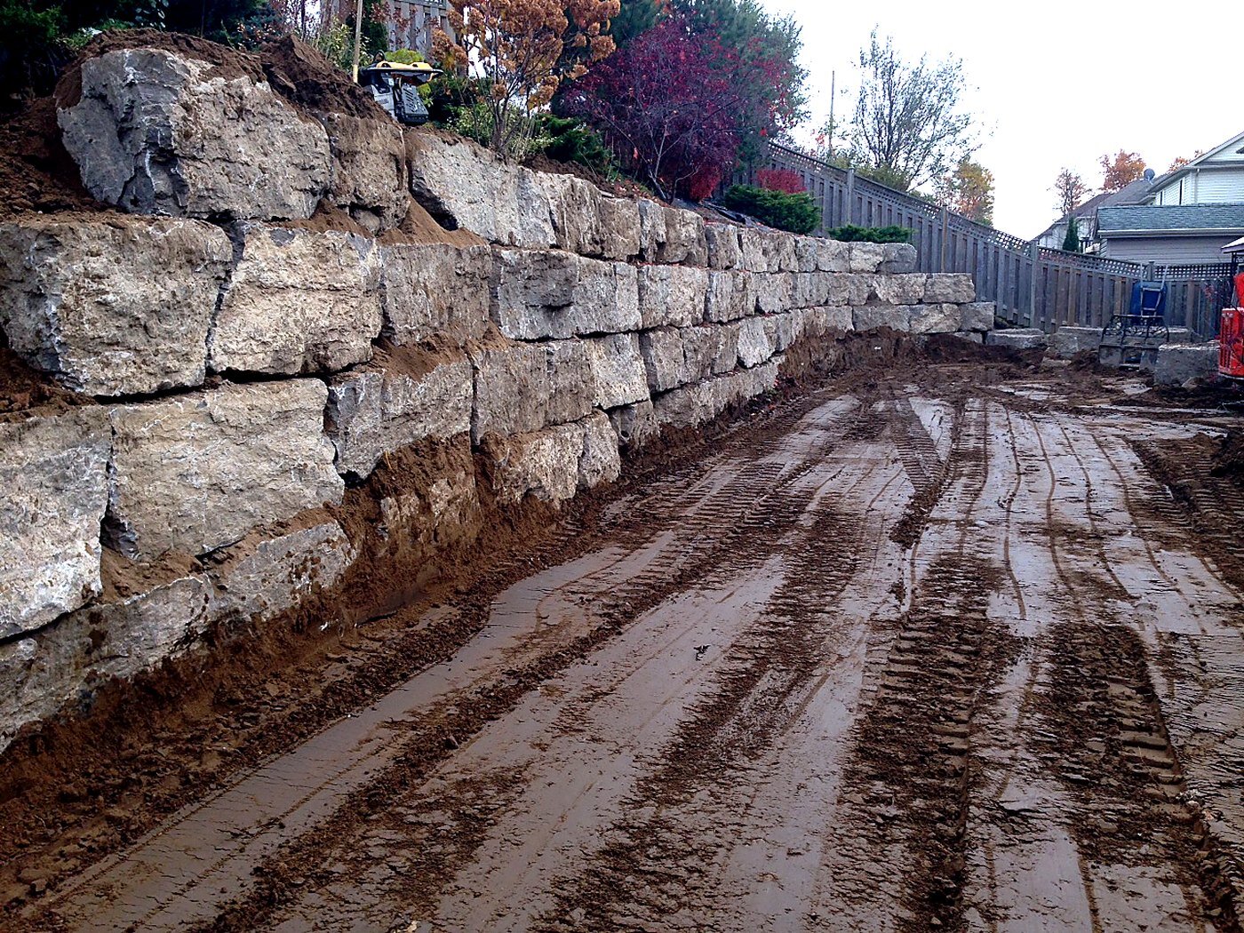 Large armour stone retaining wall — Stone Boss Inc.
