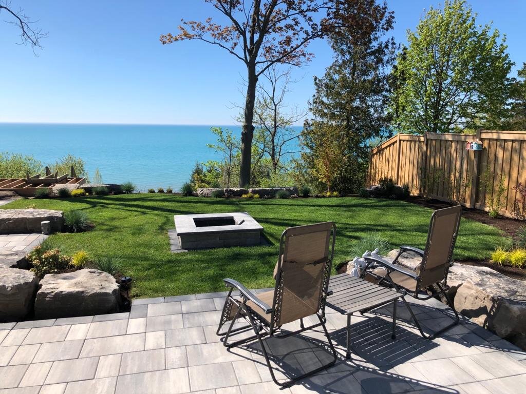 Lakefront backyard with firepit
